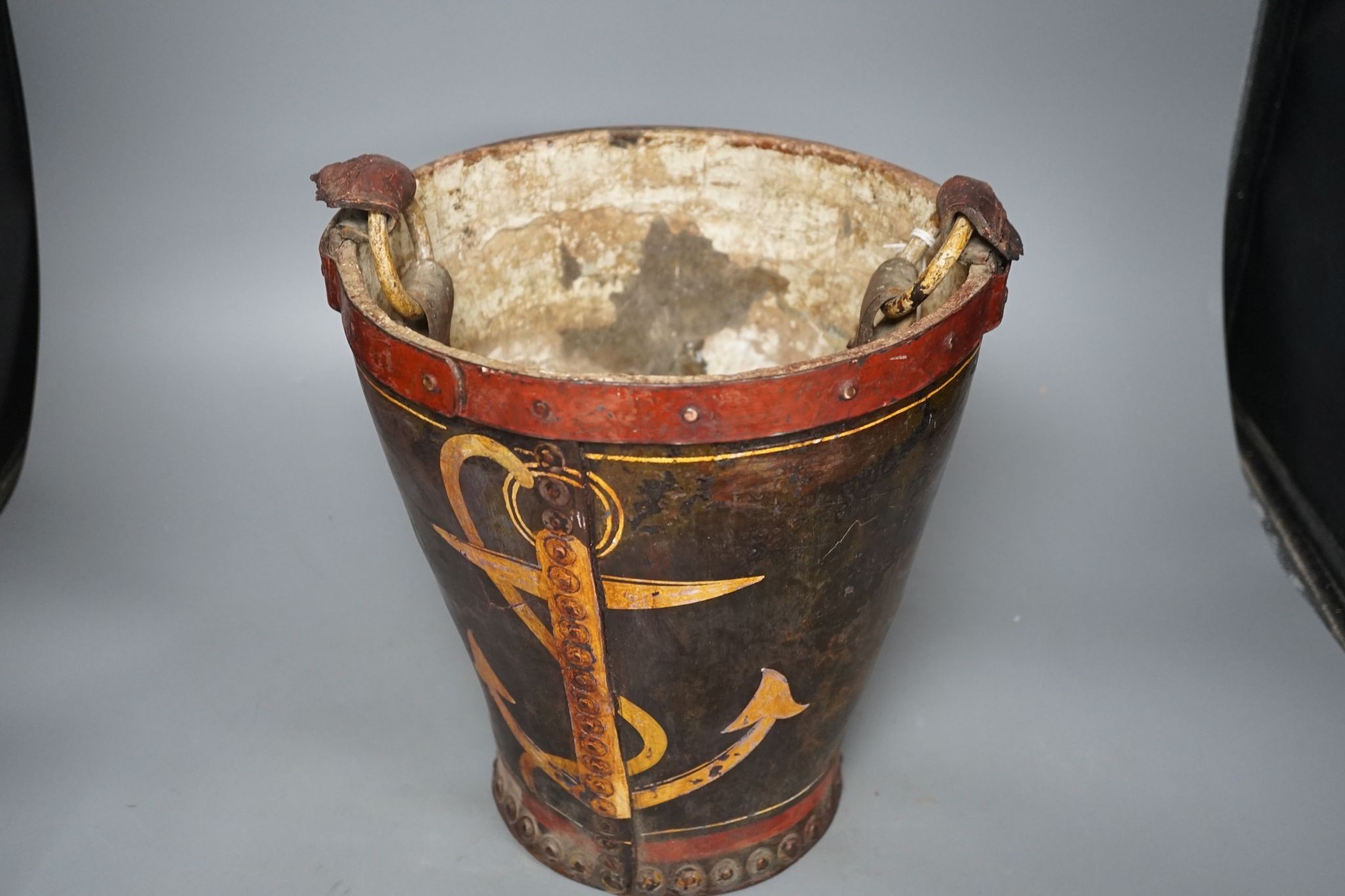 A painted leather fire bucket, later decorated ‘Government House Gibralter’ 27cm